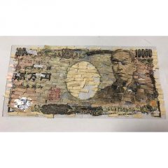 粉々になった１万円札